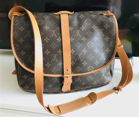 louis vuitton messenger bag price|More.